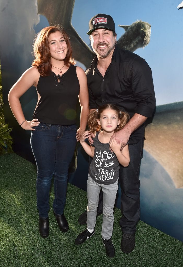 HOLLYWOOD, CA - AUGUST 08: Singer Joey Fatone (R) and guests arrive at the world premiere of Disney's "PETE'S DRAGON" at the El Capitan Theater in Hollywood on August 8, 2016. The new film, which stars Bryce Dallas Howard, Robert Redford, Oakes Fegley, Oona Laurence, Wes Bentley and Karl Urban and is written and directed by David Lowery, has been drawing rave reviews from both audiences and critics. PETE'S DRAGON opens nationwide August 12, 2016. (Photo by Alberto E. Rodriguez/Getty Images for Disney ) *** Local Caption *** Joey Fatone